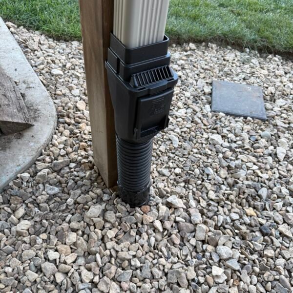 Downspout drainage connection detail