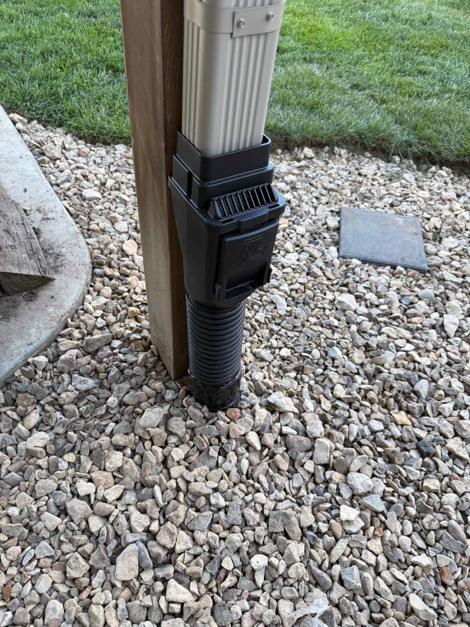 Downspout drainage connection detail