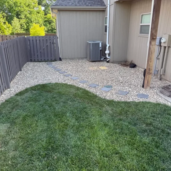 Completed rock landscaping and drainage project
